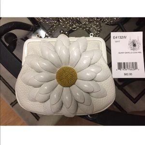 Super fun, cute high end coin purse with chain.